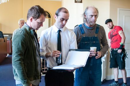 Writer/Director converses with actors Brian Sutherland and Russell Hodgkinson on the set of GHOSTLIGHT.