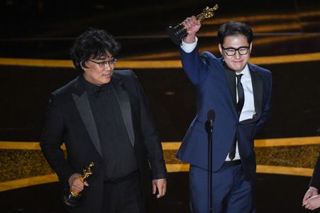 Bong Joon Ho and Han Jin-won at an event for The Oscars (2020)