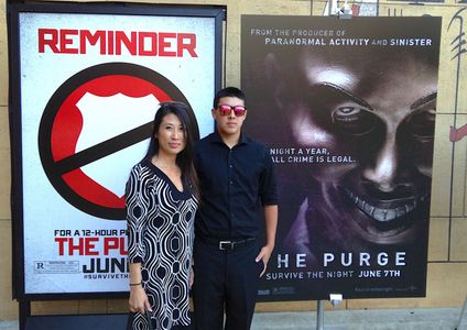 Suzanne Touchstone and Bryce Touchstone attending the premier of THE PURGE. June 3, 2013.