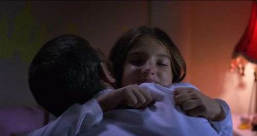 Frank Valera (Antonio Banderas) wishes his daughter, Olivia (Lillian Blankenship),goodnight with an 