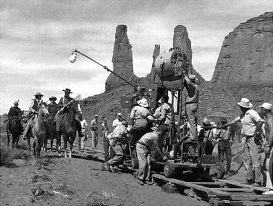 John Wayne, Ward Bond, Jeffrey Hunter, and Hank Worden in The Searchers (1956)