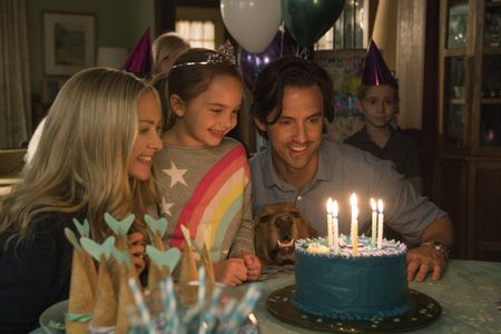 Milo Ventimiglia, Amanda Seyfried, Butler, and Ryan Kiera Armstrong in The Art of Racing in the Rain (2019)