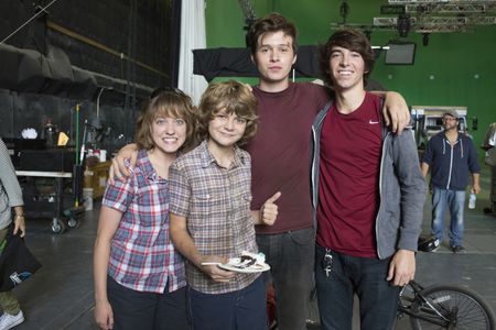 Kara Mann, Ty Simpkins, Nick Robinson, and Peyton Giacone on the set of Jurassic World