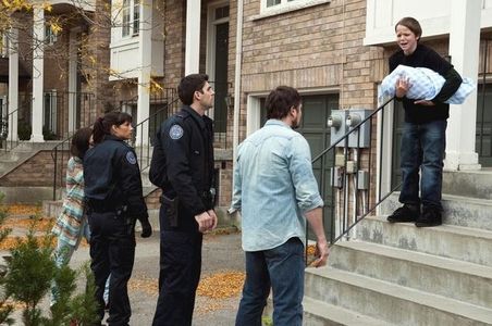 Krista Bridges, Missy Peregrym, Jonathan Goad, Nicholas Kaegi, and Travis Milne in Rookie Blue (2010)