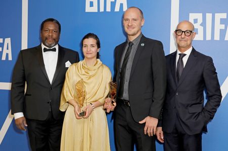 Stanley Tucci, Wendell Pierce, Waad Al-Kateab, and Edward Watts