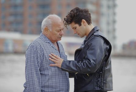 Still of Burt Young and Jacques Mitchell, in Tom in America