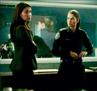 Alex Castillo, Missy Peregrym in ROOKIE BLUE