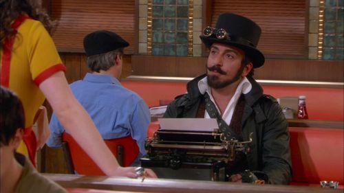 Mario Diaz and Kat Dennings in 2 Broke Girls (2011)