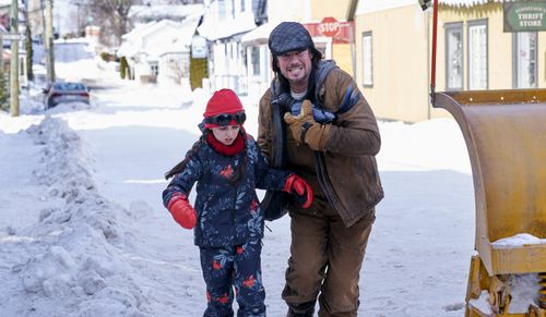 Philippe Bossé, Jerry Trainor, and Michaela Russell in Snow Day (2022)