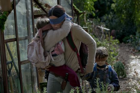 Sandra Bullock, Julian Edwards, and Vivien Lyra Blair in Bird Box (2018)