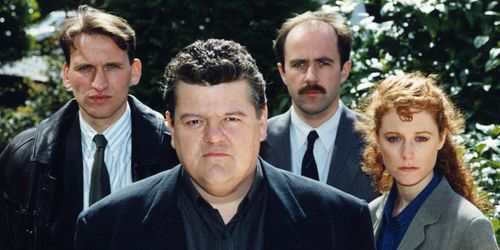 Robbie Coltrane, Christopher Eccleston, Lorcan Cranitch, and Geraldine Somerville in Cracker (1993)