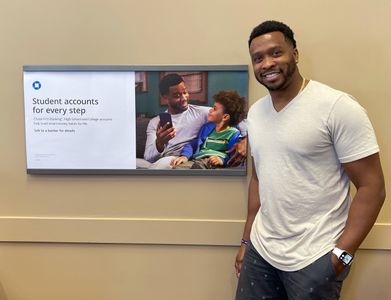 Steph posed with his photography still in Chase Bank