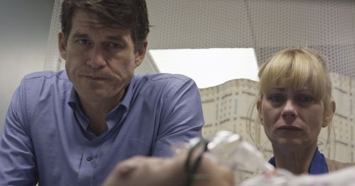 Angela Pierce and Paul Hickert in Unburden (2012)