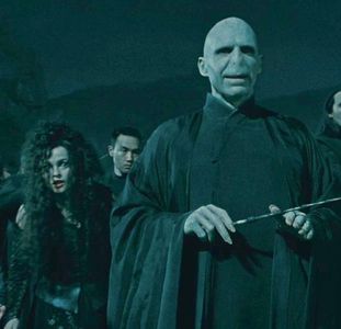 Still of Helena Bonham Carter (Bellatrix Lestrange),Joshua Jo (Death Eater) and Ralph Fiennes (Lord Voldemort) in Harry