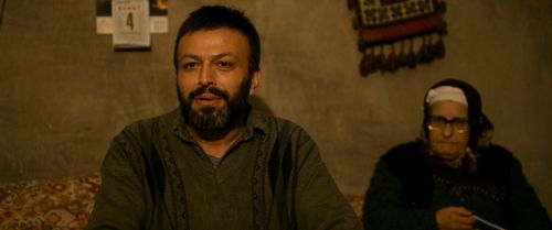 Serhat Mustafa Kiliç and Gülsen Özbakan in Winter Sleep (2014)