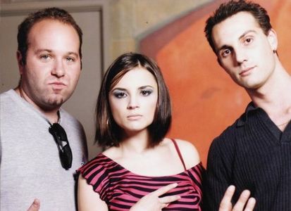 Producers Jesse Felsot (left) and Mark Heidelberger (right) with Rachael Leigh Cook on the set of Poets & Pornstars' mus