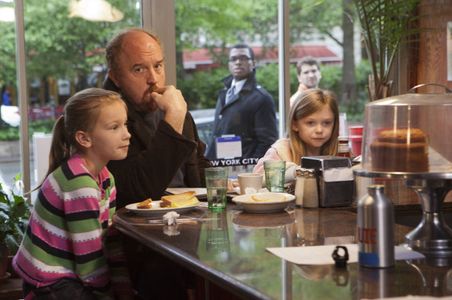 Louis C.K., Ursula Parker, and Hadley Delany in Louie (2010)