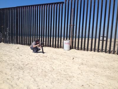 Chris Cashman shooting at US/ Mexican border in Playas de Tijuana for 