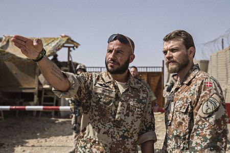 Dar Salim and Pilou Asbæk in A War (2015)