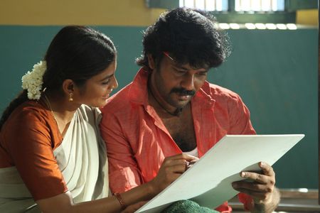 Nataraja Subramanian and Sanchita Shetty in Enkitta Mothathe (2017)