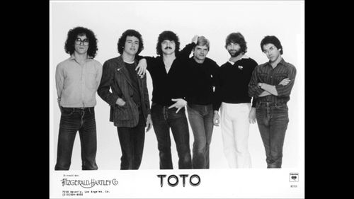 Steve Lukather, David Paich, Jeff Porcaro, Steve Porcaro, David Hungate, Bobby Kimball, and TOTO