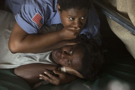 Uzo Aduba and Adrienne C. Moore in Orange Is the New Black (2013)