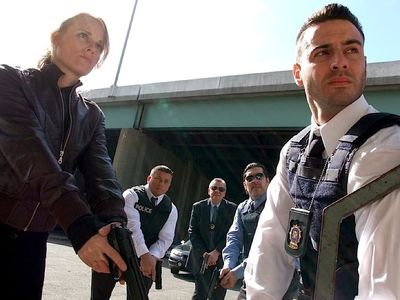 Officer Miller leads other officers in STAND OFF