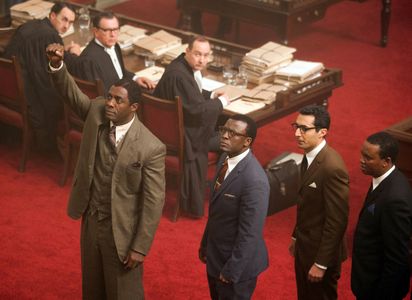 Idris Elba, Tony Kgoroge, Riaad Moosa, and Thapelo Mokoena in Mandela: Long Walk to Freedom (2013)