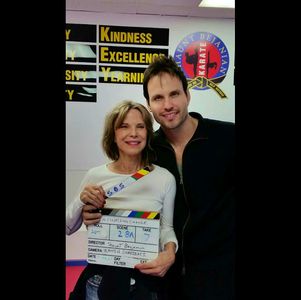 Tamas Menyhart with actress McKee Anderson on the set of 