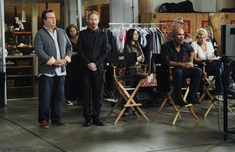 Jesse Tyler Ferguson, Eric Stonestreet, and Darren Dupree Washington in Modern Family (2009)