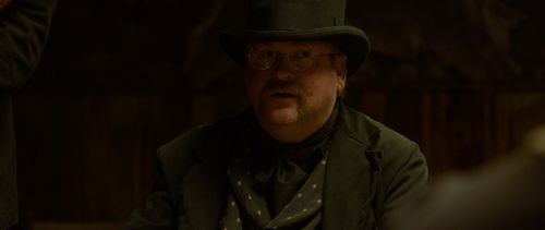 Greg Tally as Brett the Coffin Maker in a screen still from 