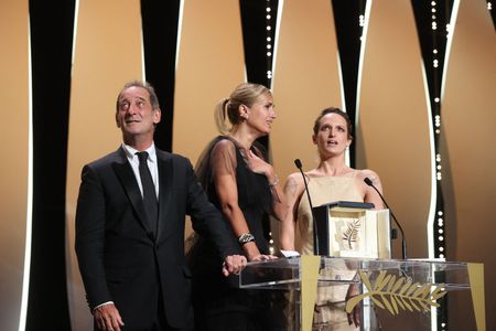 Vincent Lindon, Julia Ducournau, and Agathe Rousselle at an event for Titane (2021)