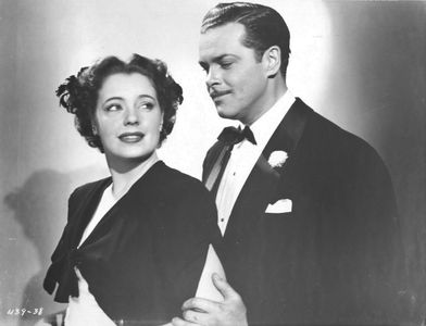 Mary Beth Hughes and Edmund MacDonald in The Lady Confesses (1945)