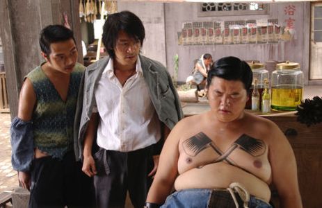 Center: Stephen Chow as Sing; Right: Lam Tze Chung as Sidekick