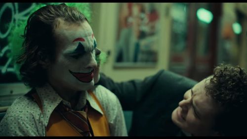 Joaquin Phoenix and Ben Warheit in Joker (2019)