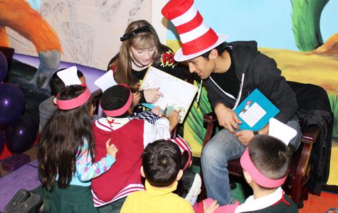 Tara-Nicole Azarian and Azim Risk read to kids in Los Angeles schools.