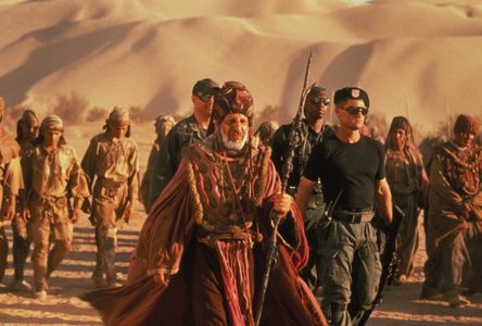 Kurt Russell, Erick Avari, John Diehl, Gianin Loffler, and Derek Webster in Stargate (1994)