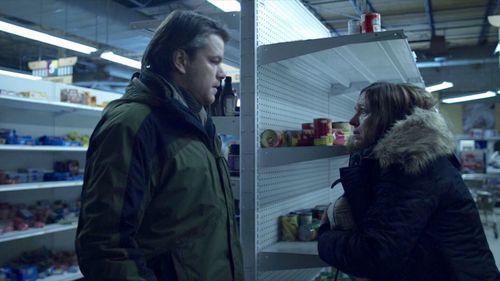 Matt Damon and Laura T. Fisher in Contagion (2011)