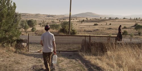 Bedir Bedir and Gonca Yakut in Prayers at Dawn (2014)