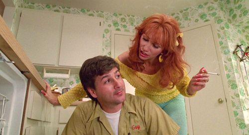 Kathy Baker and Steven Brill in Edward Scissorhands (1990)