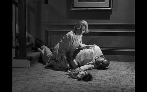 Telly Savalas and Mary LaRoche in The Twilight Zone (1959)