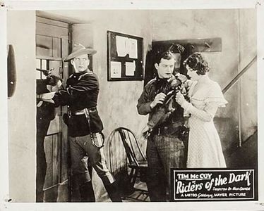 Tim McCoy, Dorothy Dwan, and Rex Lease in Riders of the Dark (1928)