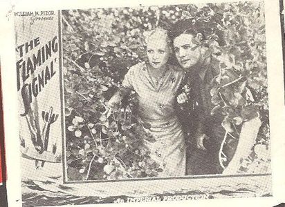 Marceline Day and John David Horsley in The Flaming Signal (1932)