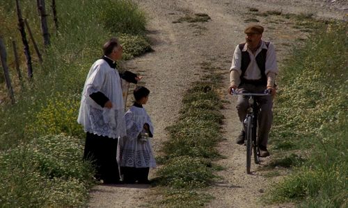 Salvatore Cascio, Philippe Noiret, and Leopoldo Trieste in Cinema Paradiso (1988)