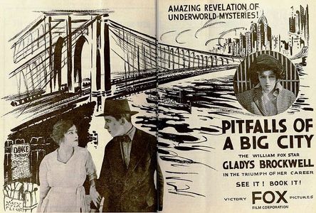 Gladys Brockwell and William Scott in Pitfalls of a Big City (1919)