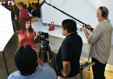 On camera interview during Mother's Red Dress premiere