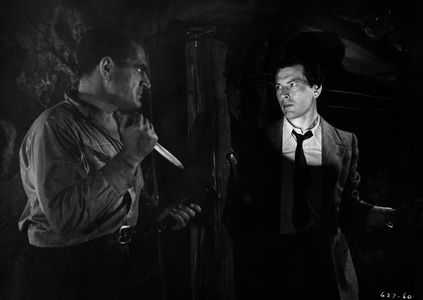 Philip Dorn and Hans Schumm in Escape in the Desert (1945)