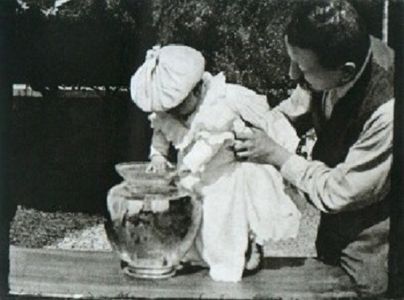 Auguste Lumière and Andrée Lumière in Fishing for Goldfish (1895)