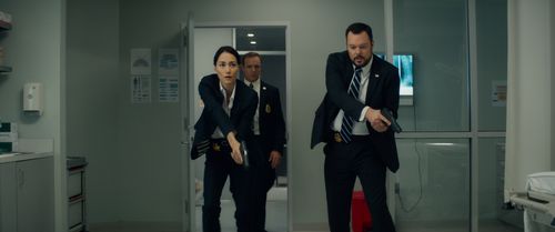 Sandrine Holt, Michael Gladis, and Griff Furst in Terminator Genisys (2015)