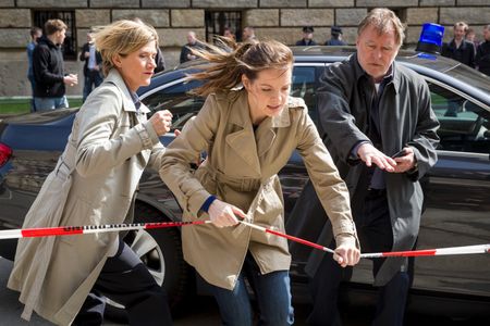 Astrid M. Fünderich, Andreas Schmidt-Schaller, and Yvonne Catterfeld in SOKO: Der Prozess (2013)